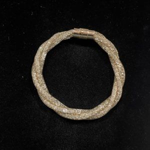 Gold tone metal mesh crystal lined bracelet